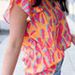Ruffled Printed V-Neck Cap Sleeve Blouse