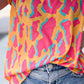 Ruffled Printed V-Neck Cap Sleeve Blouse