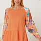 Printed Round Neck Peplum Blouse