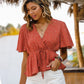 Printed Tied Flutter Sleeve Babydoll Blouse