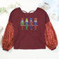 Nutcracker Sequin Crisscross Twisted Back Long Sleeve Blouse