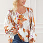 Printed V-Neck Smocked Balloon Sleeve Blouse